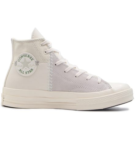 کانورس چرم کرم ساق بلند، یک انتخاب شیک و همه‌کاره برای کسانی است که به دنبال کفشی با استایل کلاسیک و رنگی خنثی هستند.